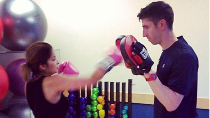 Dona boxing with her trainer Nate