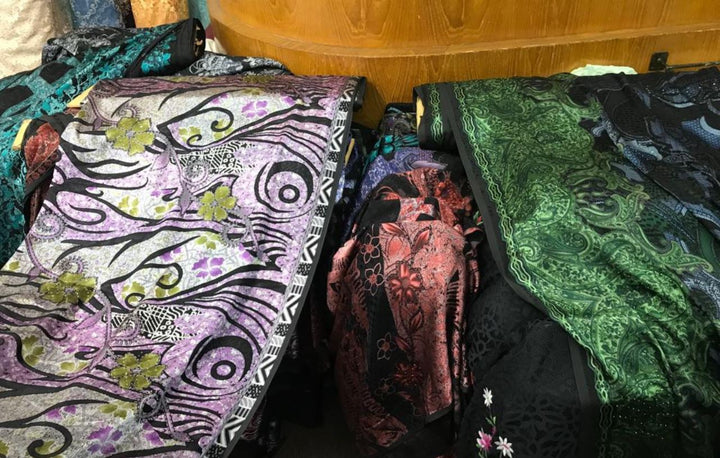 Several fabrics draped on a table