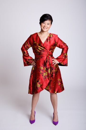 Wrap-dress done in a red silk with gold accents